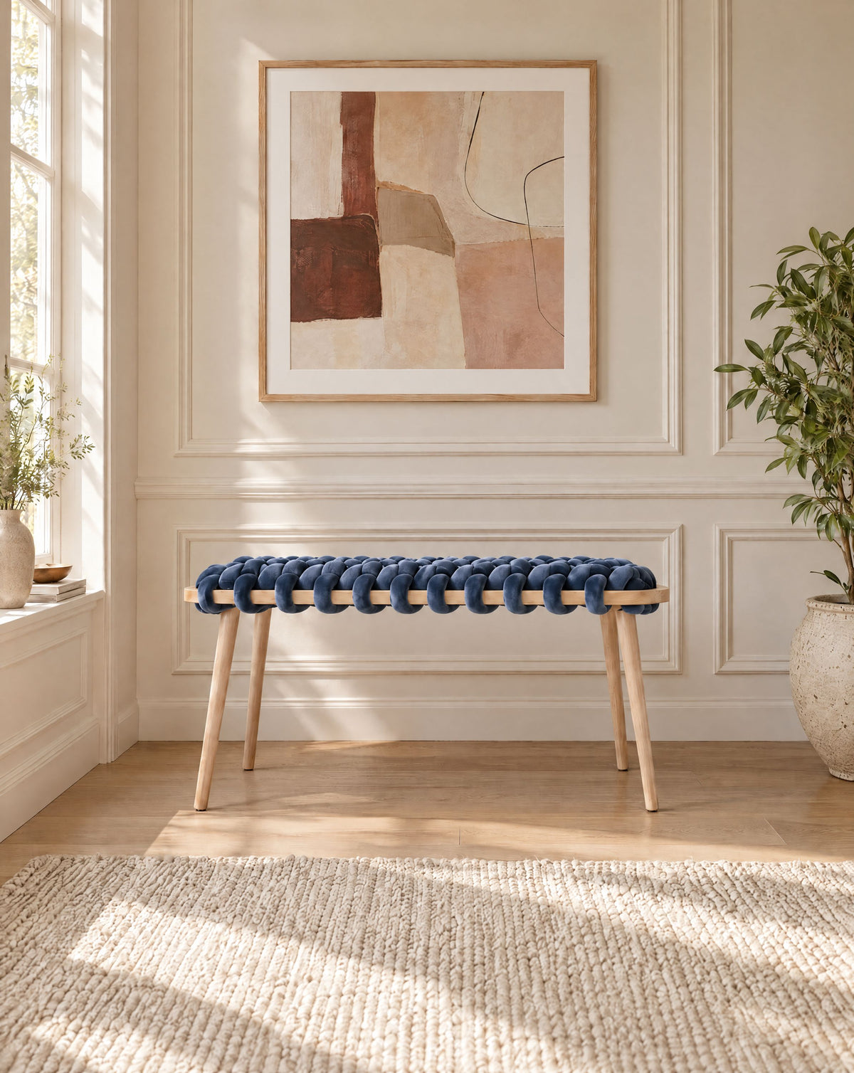 37 inch ocean blue velvet woven bench under a framed abstract artwork in a panelled room