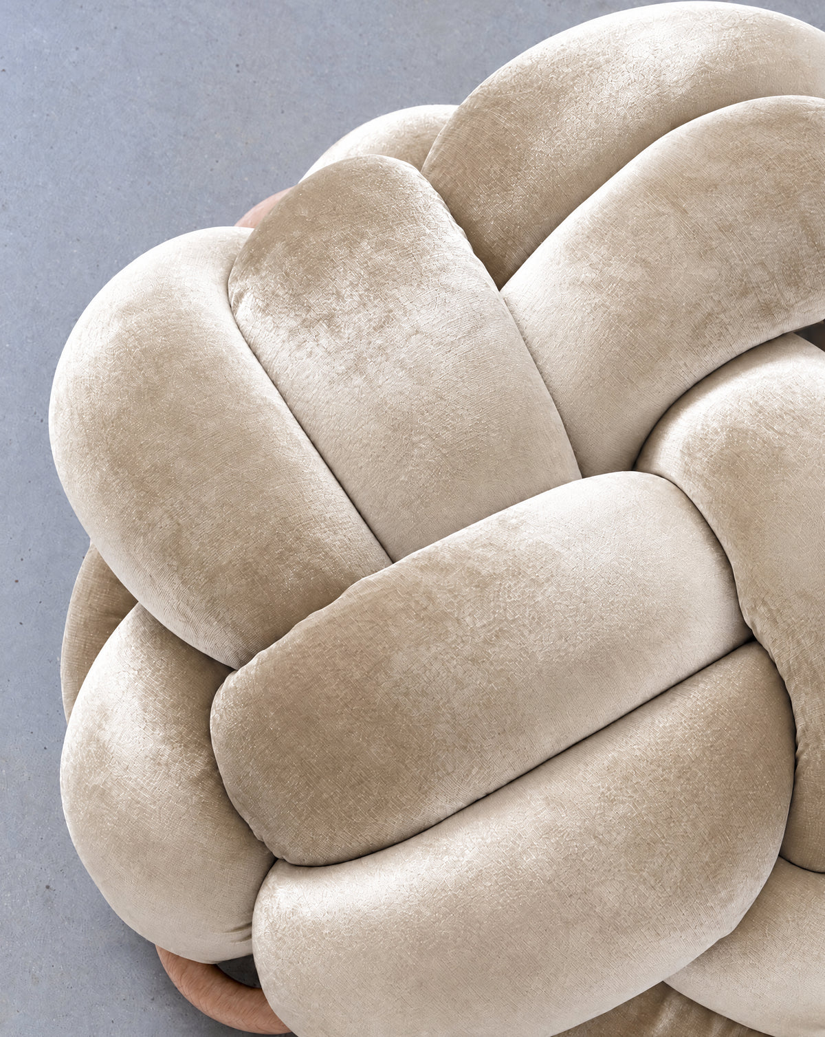 Close-up of smooth pearl velvet knot braids