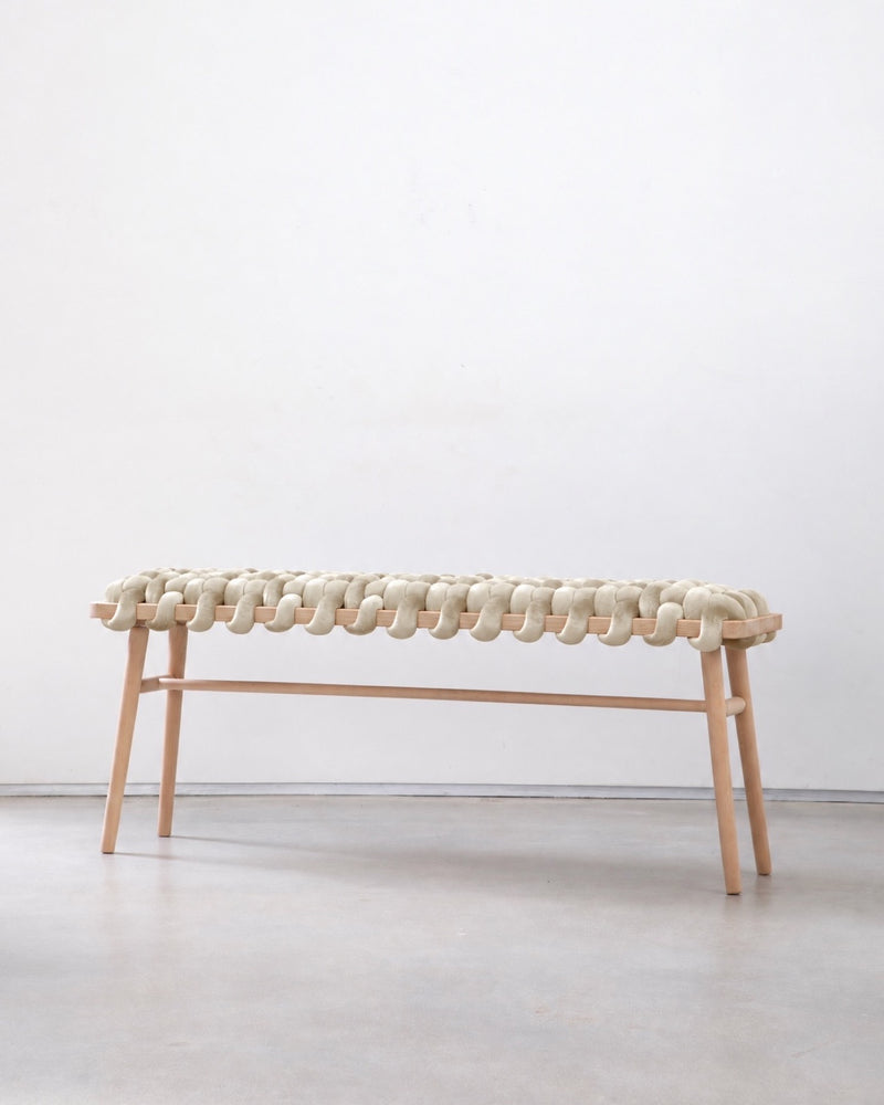47 inch pearl velvet woven bench with a beechwood frame against a white wall
