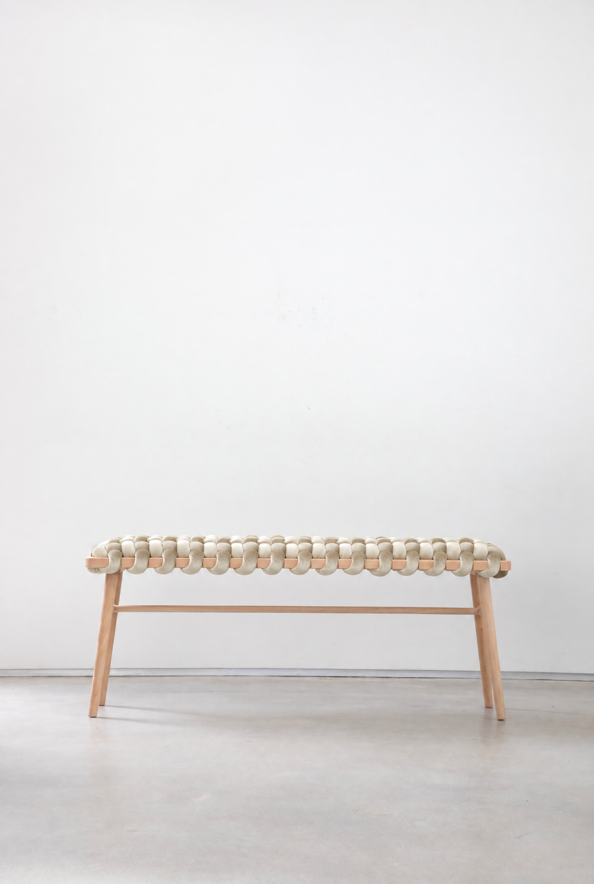 Pearl velvet woven bench with a beechwood frame and stretcher bar, side view