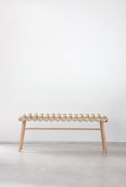 Pearl velvet woven bench with a beechwood frame and stretcher bar, side view