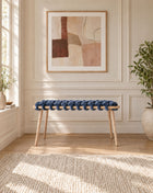37 inch ocean blue velvet woven bench under a framed abstract artwork in a panelled room