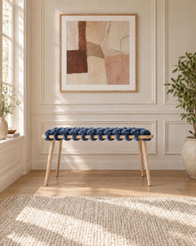 37 inch ocean blue velvet woven bench under a framed abstract artwork in a panelled room