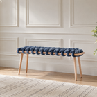 37 inch ocean blue velvet woven bench against a white panelled wall