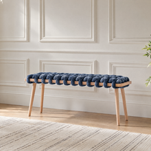 37 inch ocean blue velvet woven bench against a white panelled wall