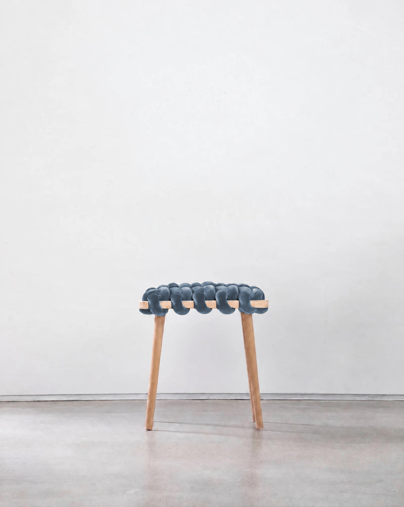 Ocean blue velvet woven stool with a beechwood frame, front view