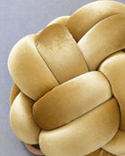 Close-up of smooth sunlight yellow velvet knot braids