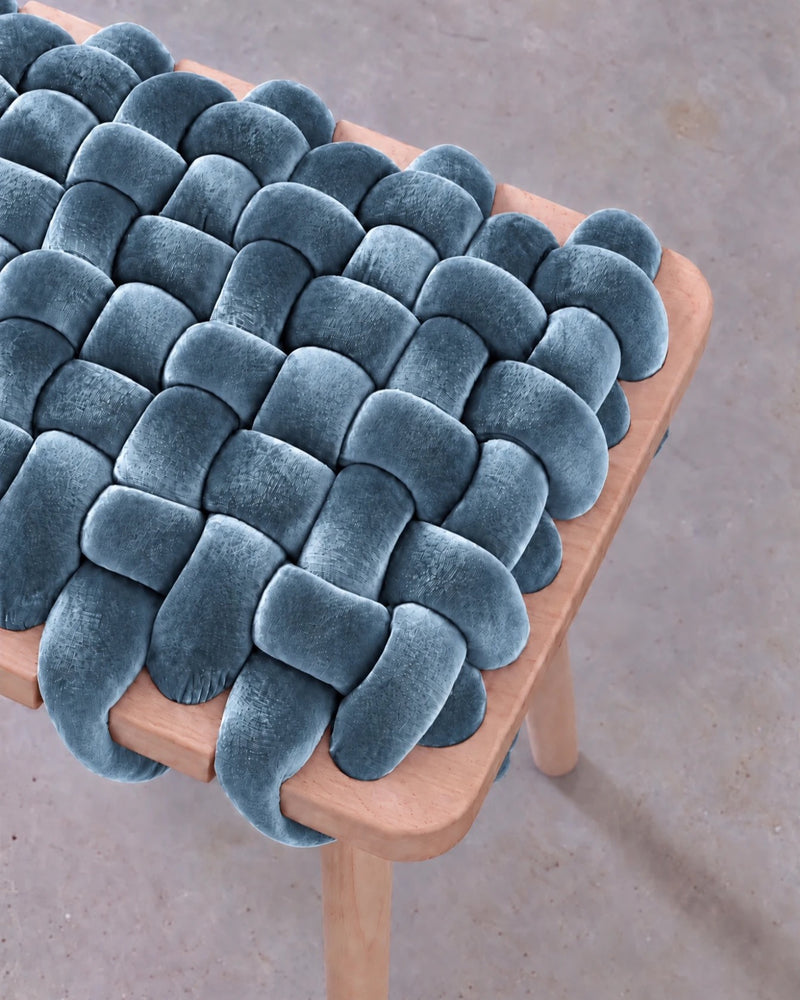 Close-up of the ocean blue velvet woven seat