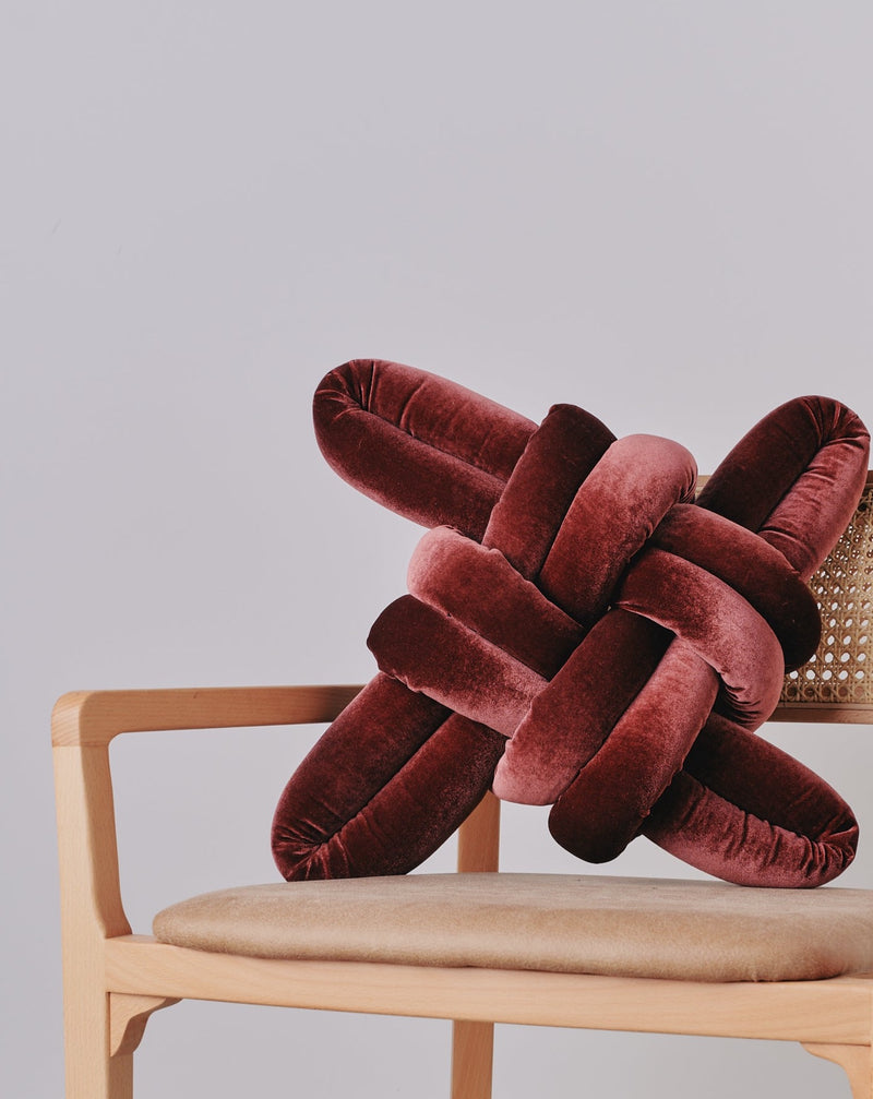 Glowing Rust Velvet Knot Pillow